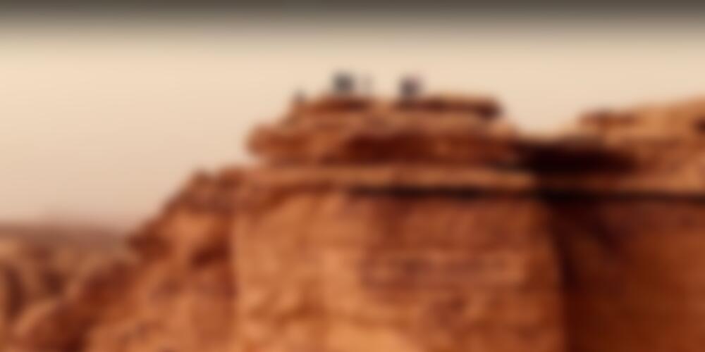 students on top of a cliff
