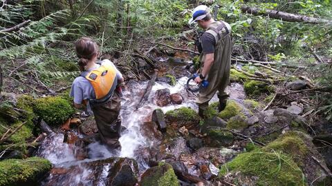 Ryan and Paige by a waterfall